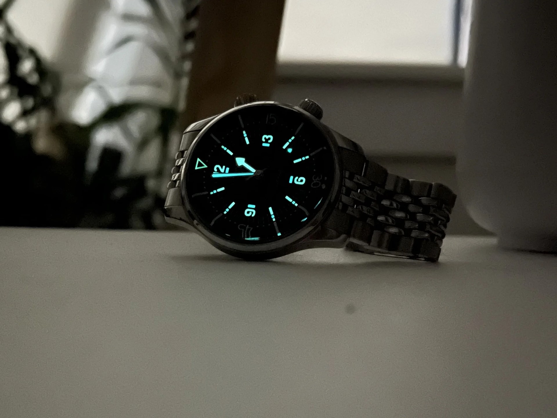 a longines watch on a table