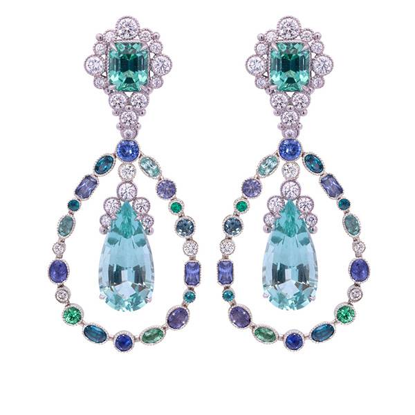 Three-piece earring suite in platinum with mint green tourmalines, aquamarines, Paraiba tourmalines, sapphires, blue zircons, and diamonds, $120,000; Featherstone Design