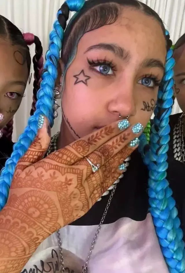 North West debuts bold look