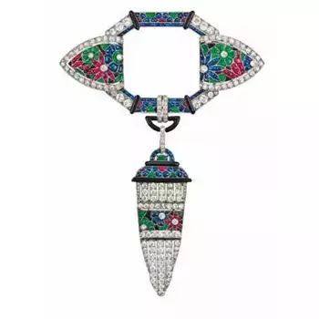 Van Cleef & Arpels platinum, millegrain-set mount, brilliant-cut diamonds, rubies, tallow-cut sapphires, emeralds and enamel 1924