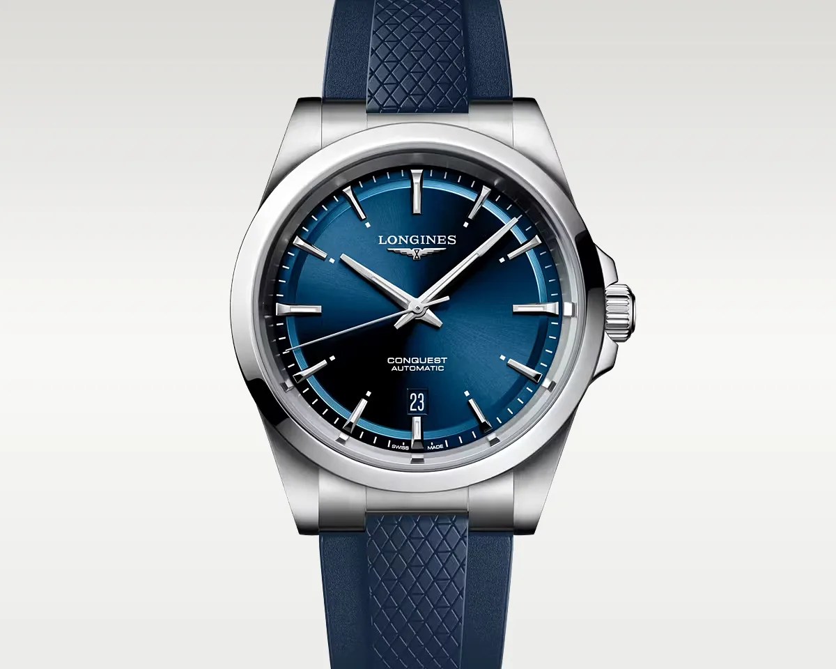 a steel watch with a blue dial and strap