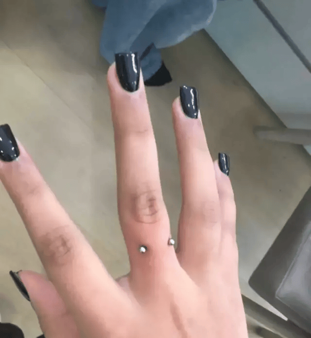 North West finger piercings