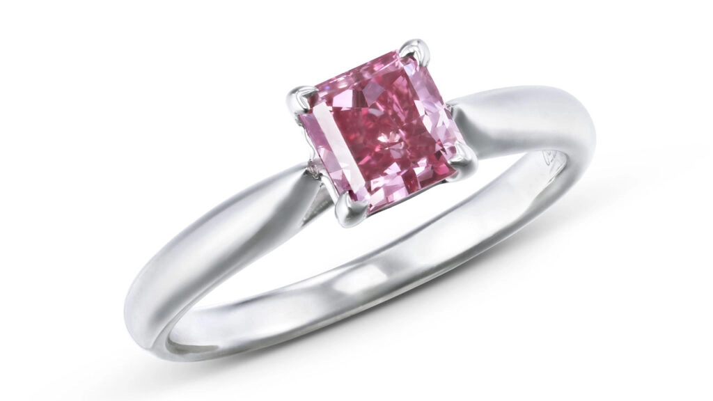This ring has a cut-cornered square modified-cut, 0.86-carat, fancy-vivid-purplish-pink, SI2-clarity diamond at Christie's image