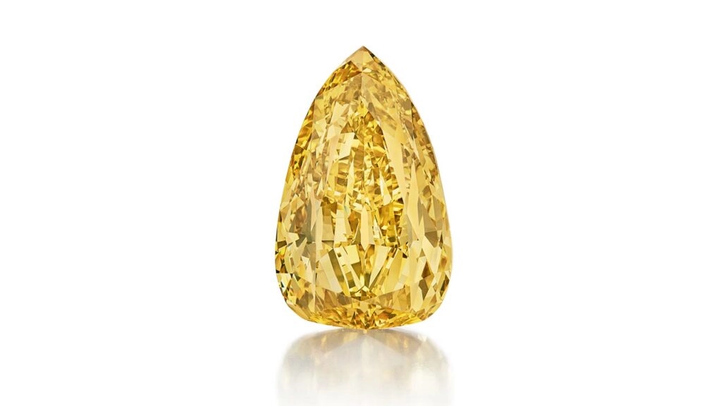Golden Canary necklace featuring a pear-shaped fancy-deep-brownish-yellow, internally flawless diamond at the Sotheby’s High Jewelry sale in Geneva image