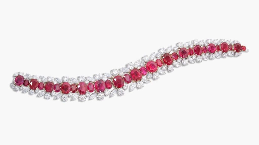 A bracelet centering a line of oval and cushion-shaped Burmese rubies, between lines of marquise-shaped and brilliant-cut diamonds at Sotheby's image