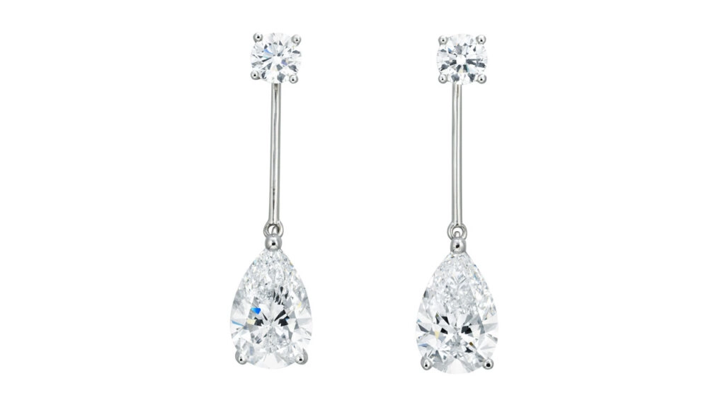 A pair of earrings featuring pear-brilliant-cut, D, VVS1 diamonds weighing 3.28 and 3.25 carats at Christie's image