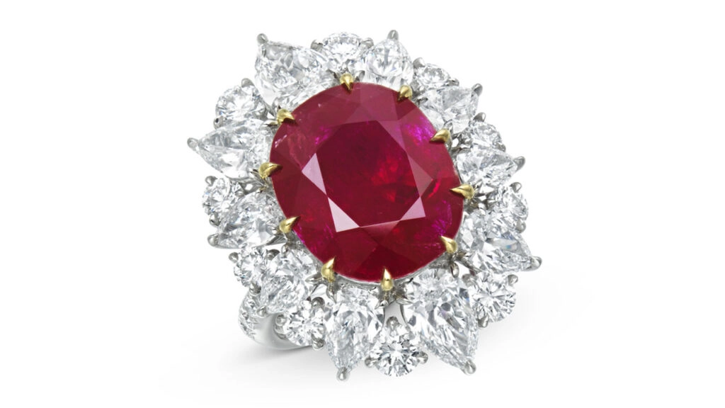 A ruby ring, this one with an oval-cut, 12.78-carat Burmese center stone in a pear-shaped and round-diamond frame at Christie's image