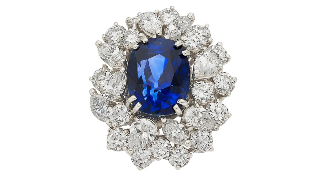 A ring bearing a cushion-shaped, 10.01-carat Kashmir sapphire, with a surround of pear-, marquise-shaped and full-cut diamonds totaling 4.85 carats at Heritage Auctions image