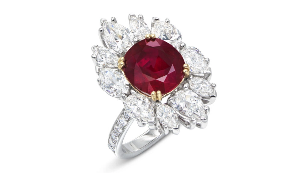 An antique cushion-cut, 4.28-carat Burmese ruby in a diamond surround lies at the center of this ring at Christie's image