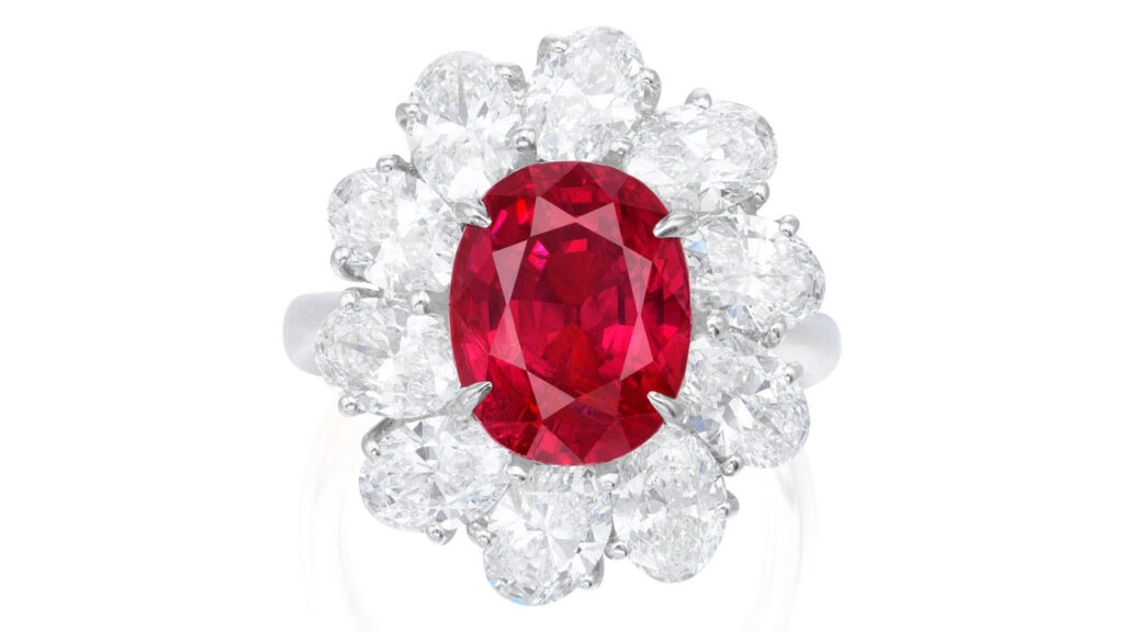 This ring bears an oval, 5.39-carat Burmese ruby framed by oval diamonds at Phillips image