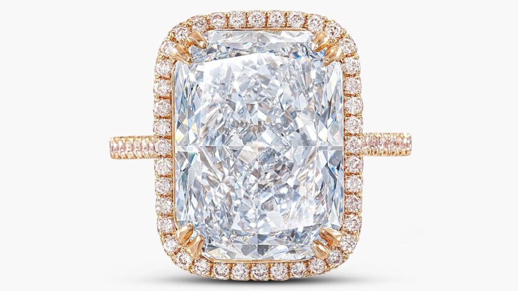 This ring features a cushion-shaped, 7.63-carat, fancy-blue, VVS1-clarity diamond in a surround of brilliant-cut diamonds with a pink tint by Sotheby's image