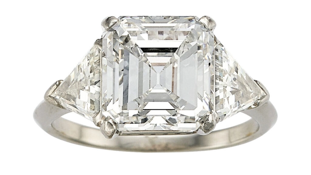 Estimate: $80,000 to $100,000

An emerald-cut, 4.71-carat, F, VS1 diamond between two calf’s head-cut diamonds at Heritage Auctions image