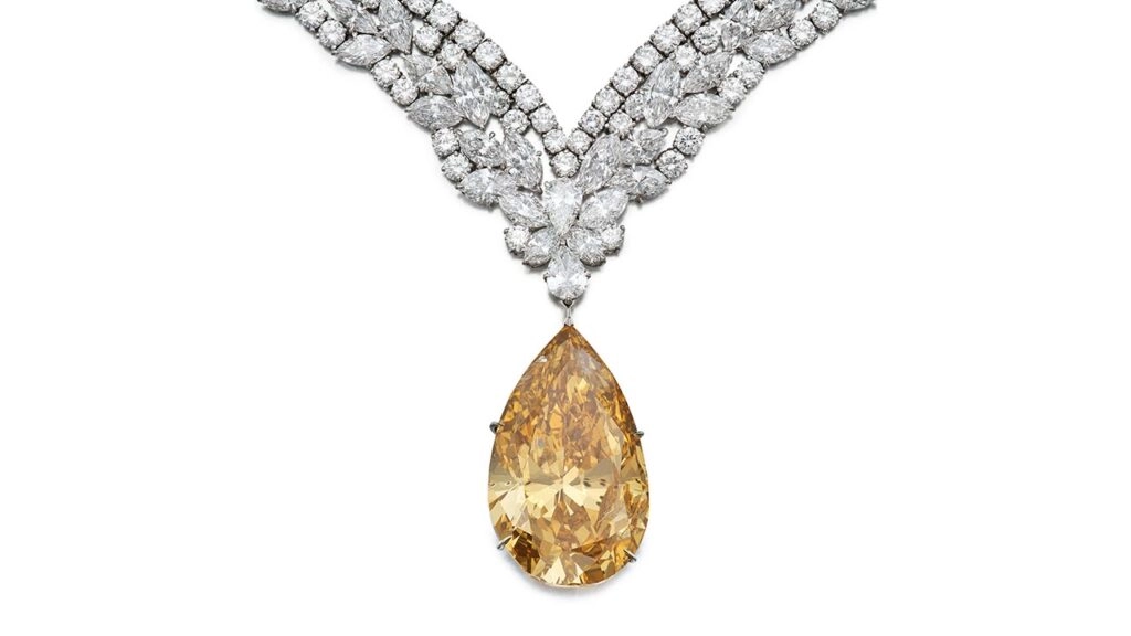 Cartier necklace containing a pear-shaped fancy-deep-brown-orange diamond set in white gold at the Sotheby’s High Jewelry sale in Geneva image