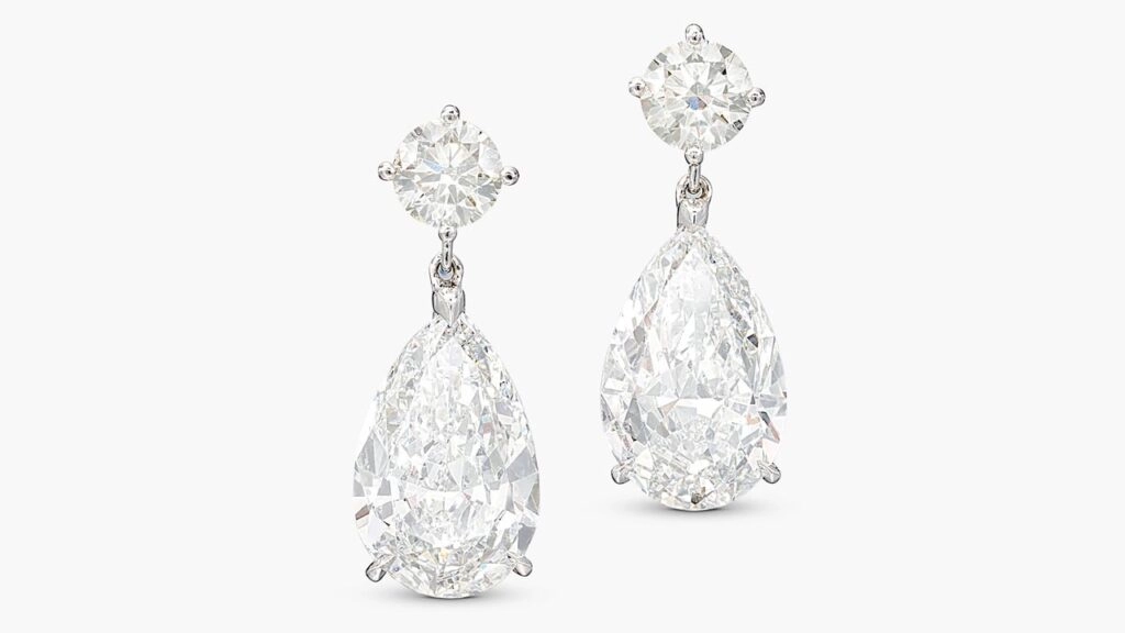 A pair of earrings sporting two pear-shaped, E-color, VVS2-clarity diamonds — of 3.10 and 3.16-carats — suspended from brilliant-cut diamonds at Sotheby's image
