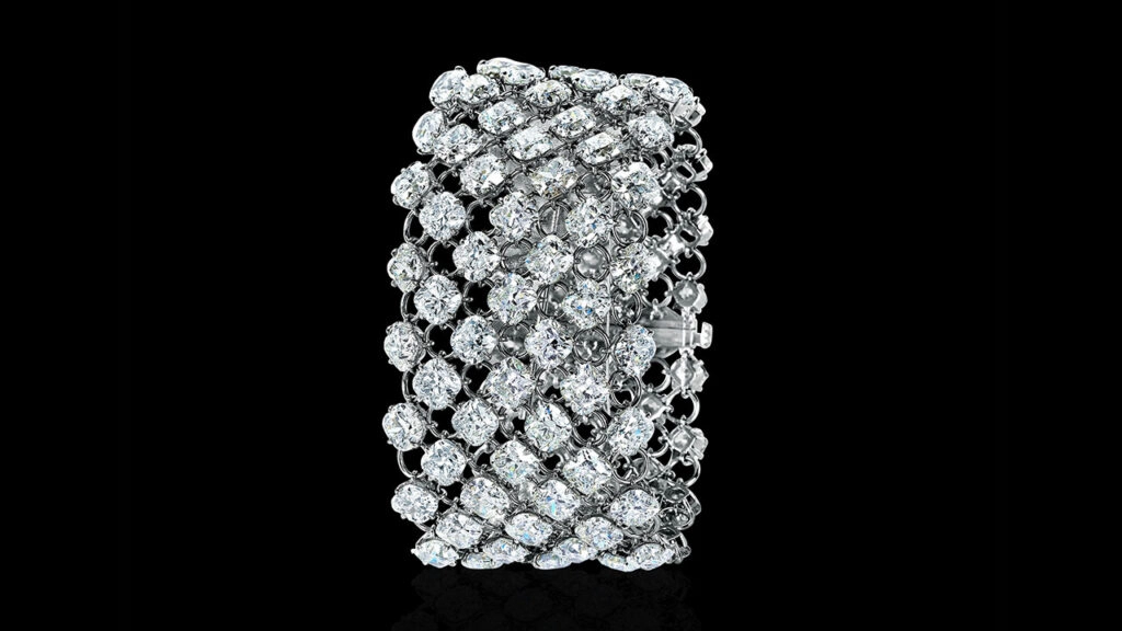 A diamond and mesh bracelet carrying 92 cushion-cut diamonds totaling 108.50 carats, in the E to I, internally flawless to SI1 range at Joopiter image