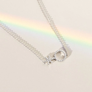 14K Yellow GoldNon-Binary Symbol Diamond Pendant (1/5 ct. tw.)