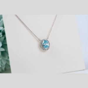 Blue Oval Diamond Ring