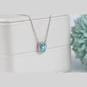 Blue Oval Diamond Ring