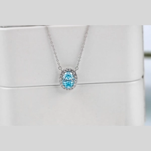 Blue Oval Diamond Ring