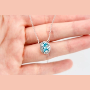 Blue Oval Diamond Ring